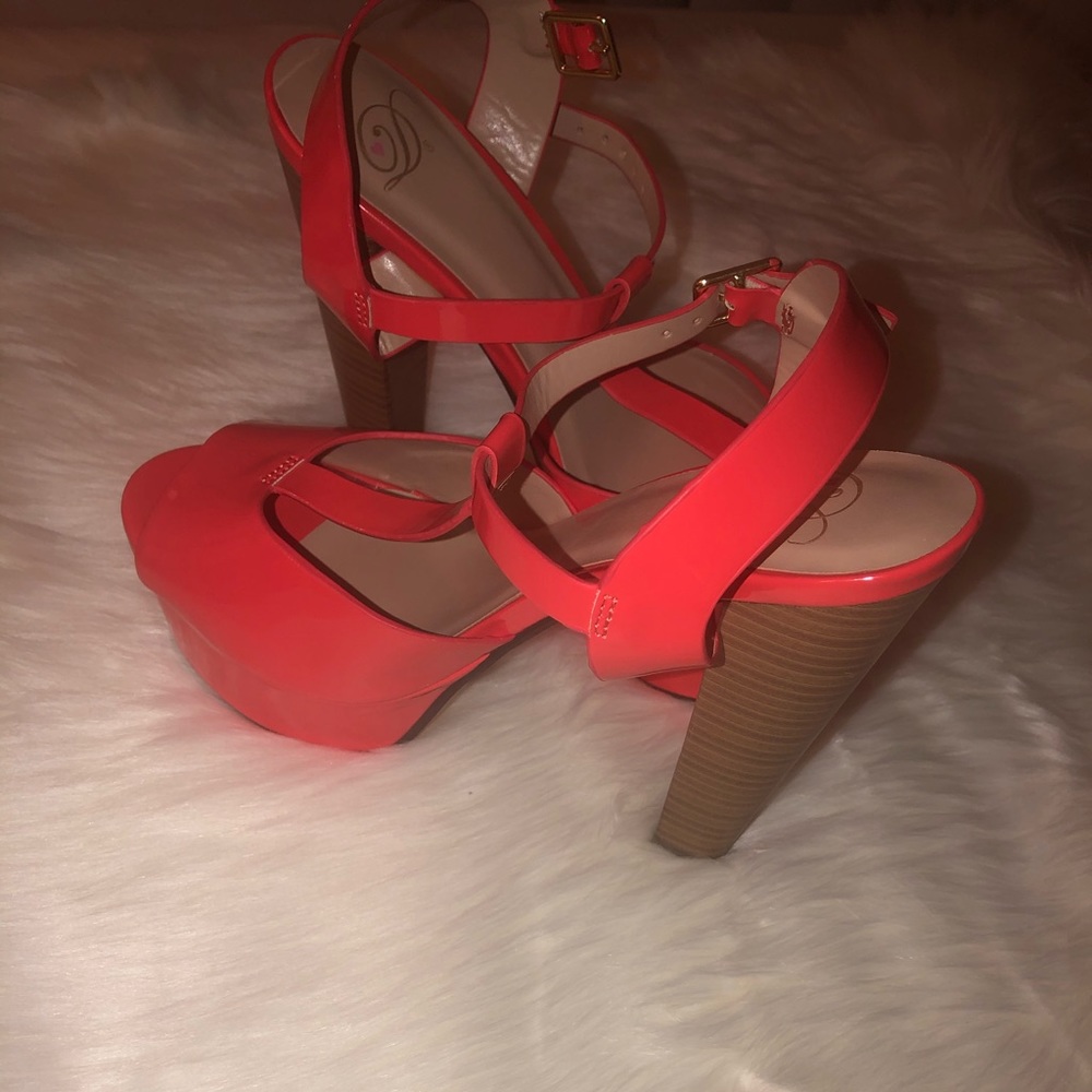 Orange Women’s size 9 platform heels. Fairly new